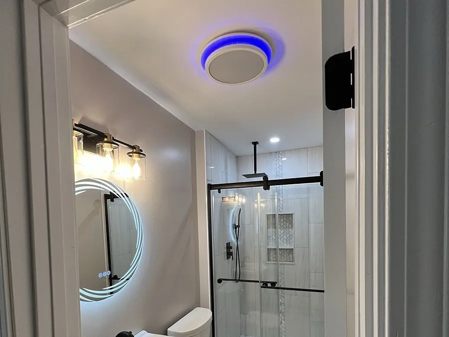 Bathroom lighting with LED exhaust fan light and vanity fixture