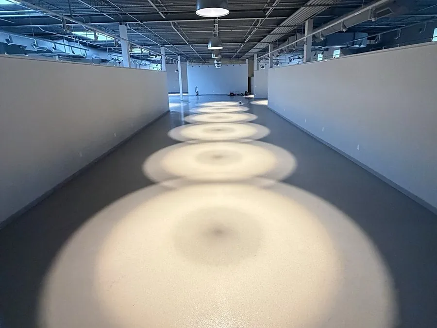 Commercial pendant lighting installed in a warehouse space
