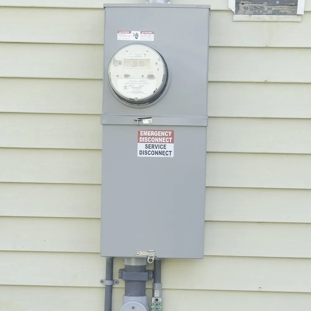 New meter and service disconnect installed by Julio Bobato Electrician on the North Shore, MA